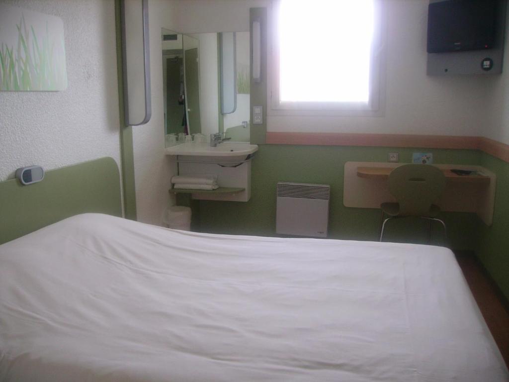 Ibis Budget Ремирмон Номер фото
